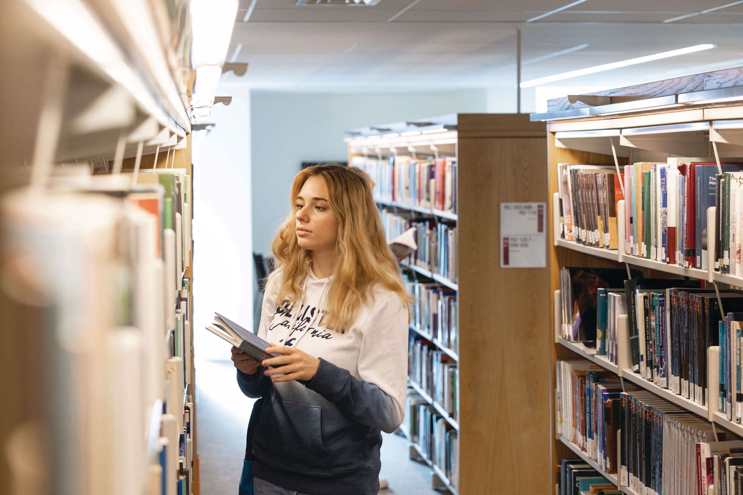 A University of Kent Student in the Library.