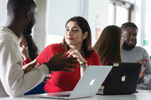 Two Kent students debate in class.